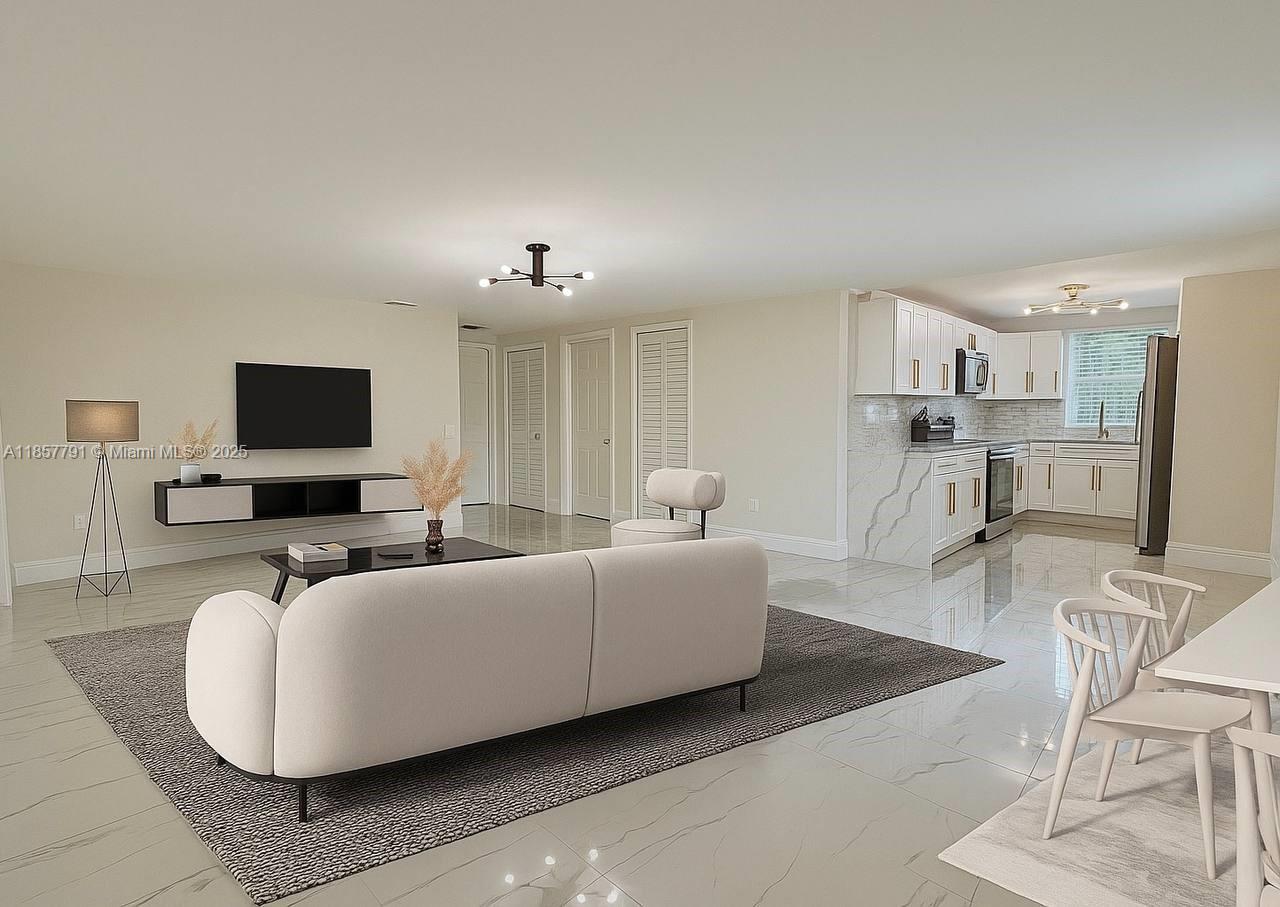 Two homes in one building.Stunning fully remodeled 5-bedroom,4-bath,2-kitchen - Two laudry in the heart of West Park,Real 2,190 sq.ft. of living area. Flexible layout can function as two separate residences—perfect for a rental investment opportunity. Features a new roof with permit.new A/C with new ducts,complete interior remodel, new electrical panel, feeder wire, and full house rewiring.new 2 unit water heaters, smoke detectors, new water pipe lines,and new sewer lines to city connection.Additional highlights: new interior/exterior doors, flooring,baseboards, two fully remodeled kitchens with hardwood cabinets,new electrical and plumbing fixtures, new driveway finish,newsprinkler system.One electric meter and one water meter, with two separate interior electrical panels.A must see!