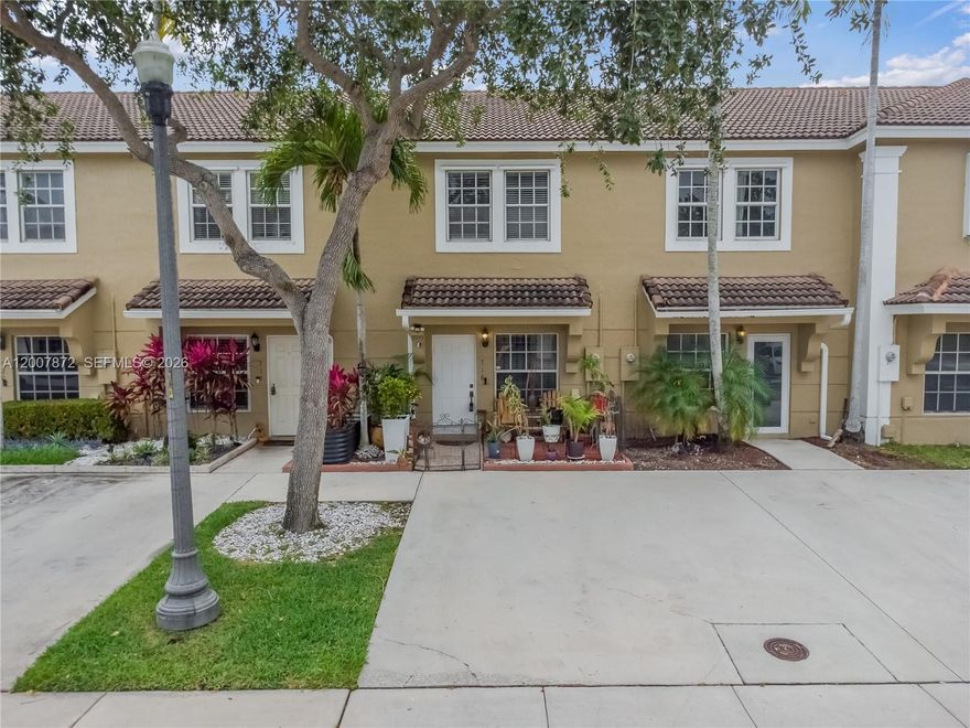AMAZING OPPORTUNITY to own in Pelican Point, a beautiful and gated community in the heart of Pembroke Pines. This property has been loved and cared for by one owner who spared no expense in the upgrades made to home. This is a move in ready townhome; fresh interior paint and new lighting fixtures enhance the space. Cherry Rustic Cabinets w/glass cabinet doors. Upstairs the flooring is natural hardwood and downstairs boasts bamboo flooring. All counter tops are granite. all toilets are brand new Kohler high efficiency with modern low-flush for quiet eco friendly use. Outdoors you will enjoy private patio with plexiglass windows, cozy yard and welcoming front porch. There are 2 private parking spots. Low HOA covers but not limited to  common area, pool, tennis clubhouse, basic cable etc..  From this property you can walk if you wanted to; Trader joe, Memorial Hospital West, restaurants, bank, Publix etc. I75 is approx 3 mins away