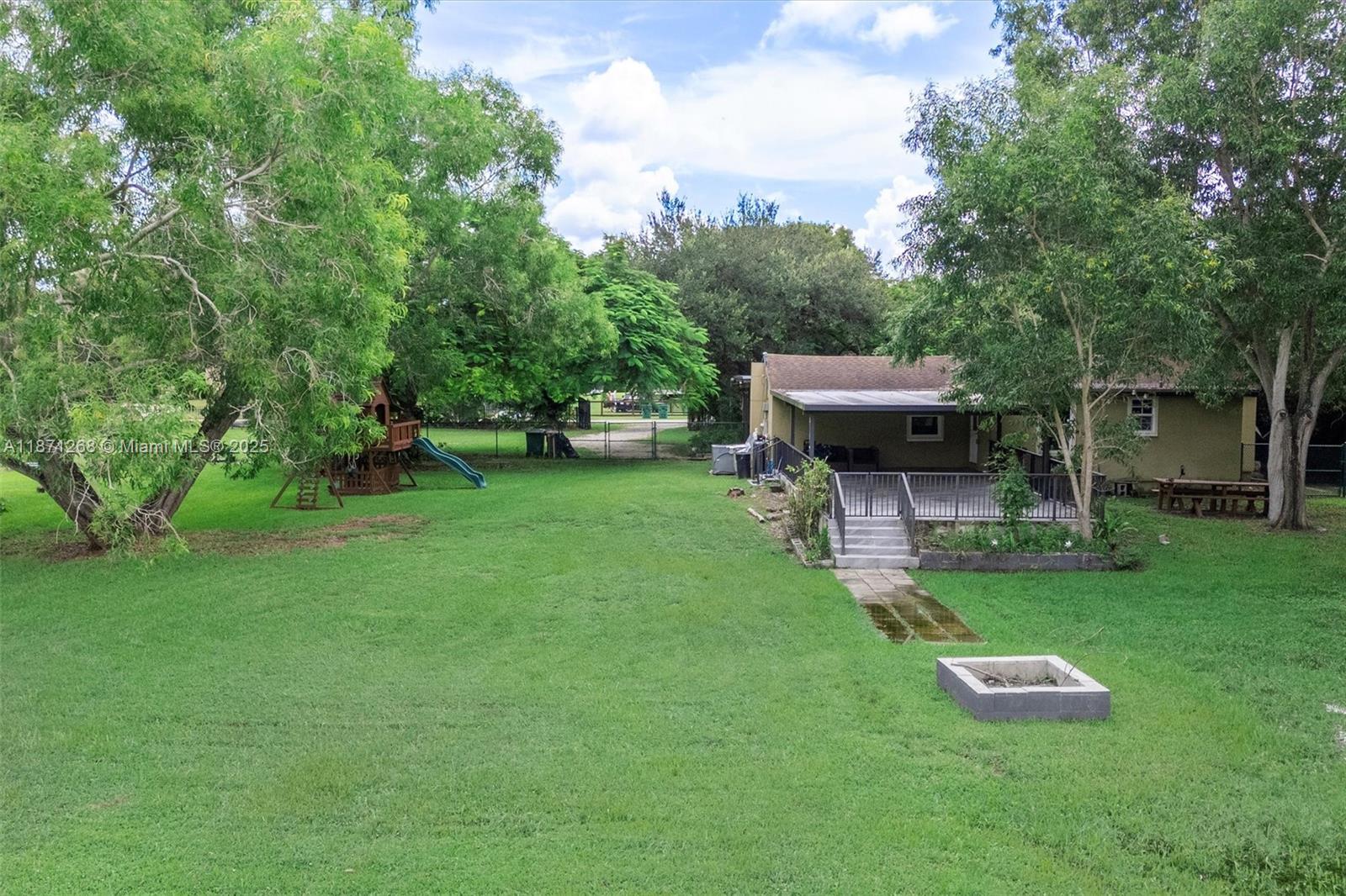 Exceptional 1.26-acre property in Davie with endless potential! Fully renovated 3 Bedrooms / 2 Bathrooms single-floor home with no HOA and gated entry. Enjoy a bright white kitchen with stainless steel appliances & luxury vinyl flooring. Both bathrooms are fully remodeled with dual sinks. Updates include well water with filtration and softener, septic serviced in 2023, water heater 2013, AC 2016 & Roof 10 years old. Large laundry room. Abundant storage space. Outdoors features a covered patio, large shed, fire pit, fruit trees, and kids’ play fort—plus room for a pool, RV, or boat. Fully fenced for privacy, this property is ideal to enjoy now or to expand/build your dream estate. Close to highways, dining, and A+ schools. Mortgage savings may be available for buyers of this listing.