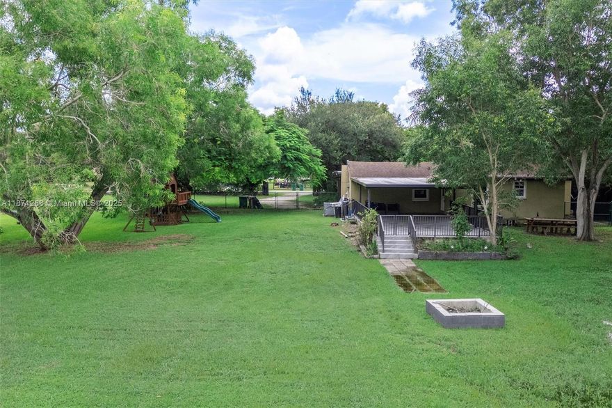 Exceptional 1.26-acre property in Davie with endless potential! Fully renovated 3 Bedrooms / 2 Bathrooms single-floor home with no HOA and gated entry. Enjoy a bright white kitchen with stainless steel appliances & luxury vinyl flooring. Both bathrooms are fully remodeled with dual sinks. Updates include well water with filtration and softener, septic serviced in 2023, water heater 2013, AC 2016 & Roof 10 years old. Large laundry room. Abundant storage space. Outdoors features a covered patio, large shed, fire pit, fruit trees, and kids’ play fort—plus room for a pool, RV, or boat. Fully fenced for privacy, this property is ideal to enjoy now or to expand/build your dream estate. Close to highways, dining, and A+ schools. Mortgage savings may be available for buyers of this listing.