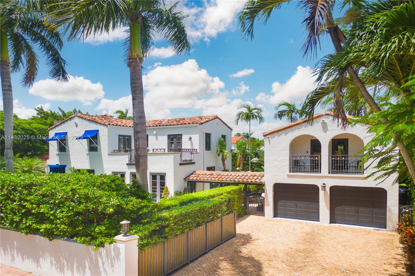 Welcome to Villa Fiori, your dream home, located on the prestigious La Gorce Drive. This two- story 5 bedroom & 4 bath, corner lot home blends 1920’s Mediterranean architecture with the privacy of a serene low maintenance matured landscaping elements. The residence features an updated kitchen w/ eat-in breakfast nook, stainless steel appliances, impact windows, pre-wired security system, concrete wall, dining room, sunroom, living room with wood burning fireplace & vintage details. Enjoy a flowing open floor layout w/ soaring ceilings, porcelain hand painted floor tiles & oak wood floors. Gas heated pool& sauna. Entertain in style with your outdoor terrace space fitted w/ outdoor gas-line. Main residence has 4 bedrooms/3baths. Separate guest house w/bedroom, kitchenette & bathroom.