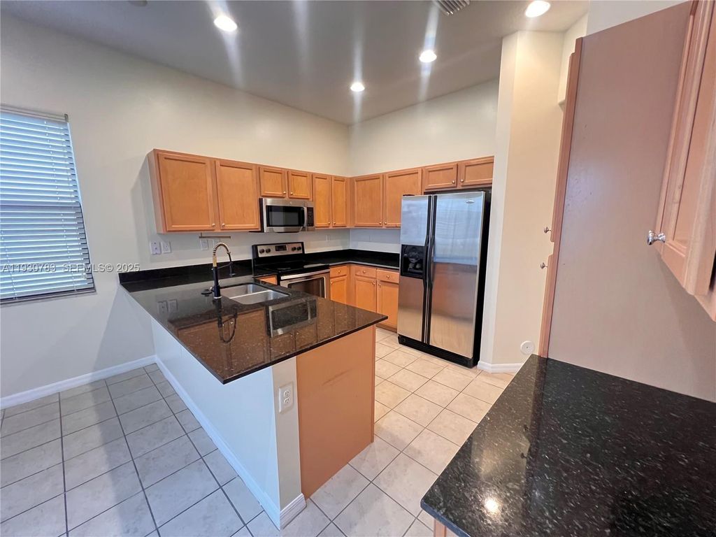 Photo of 9165 SW 36th Mnr, Miramar, FL 33025 (MLS # A11930783)