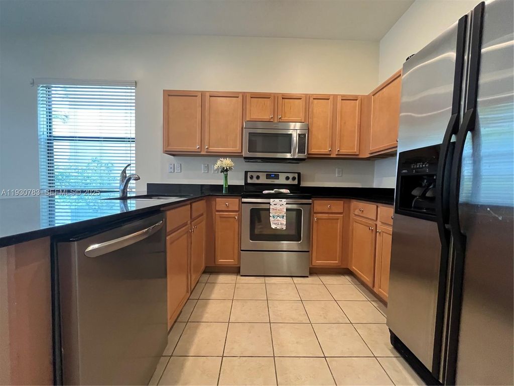 Photo of 9165 SW 36th Mnr, Miramar, FL 33025 (MLS # A11930783)