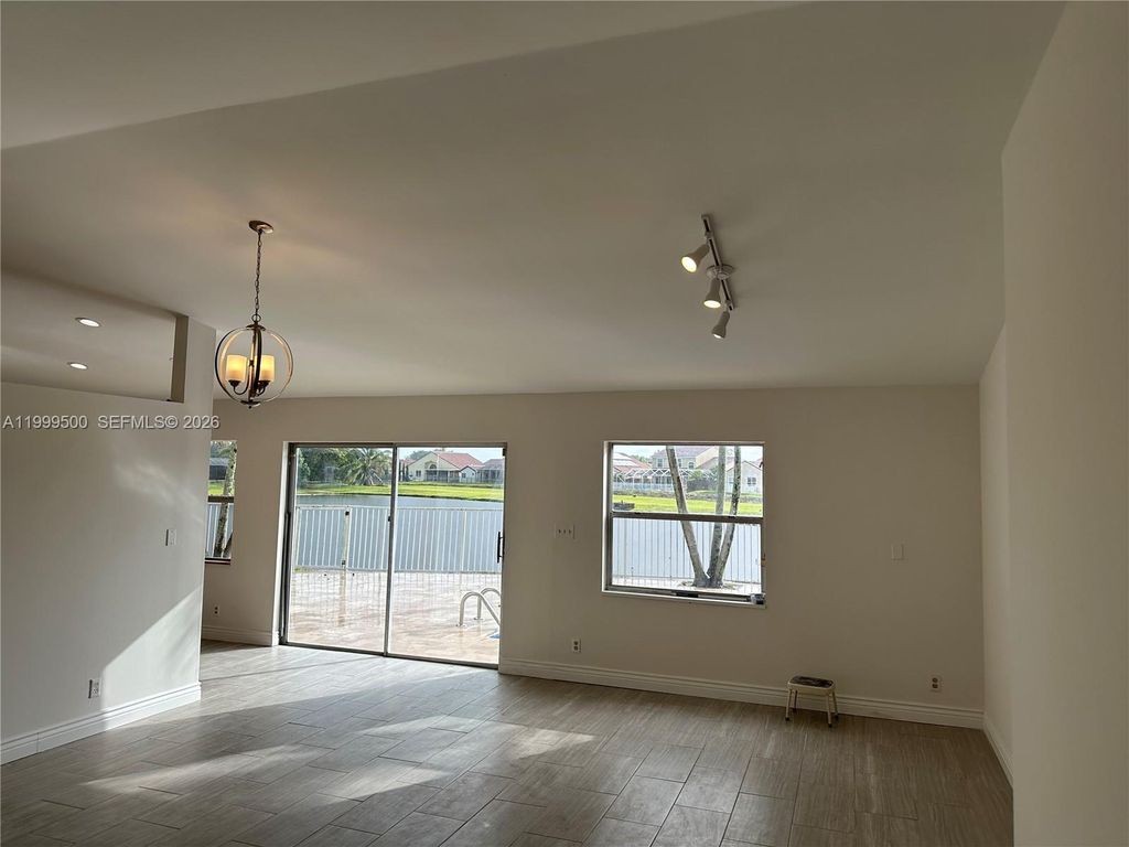 Photo of 9841 Ridgecreek Rd, Boca Raton, FL 33496 (MLS # A11999500)