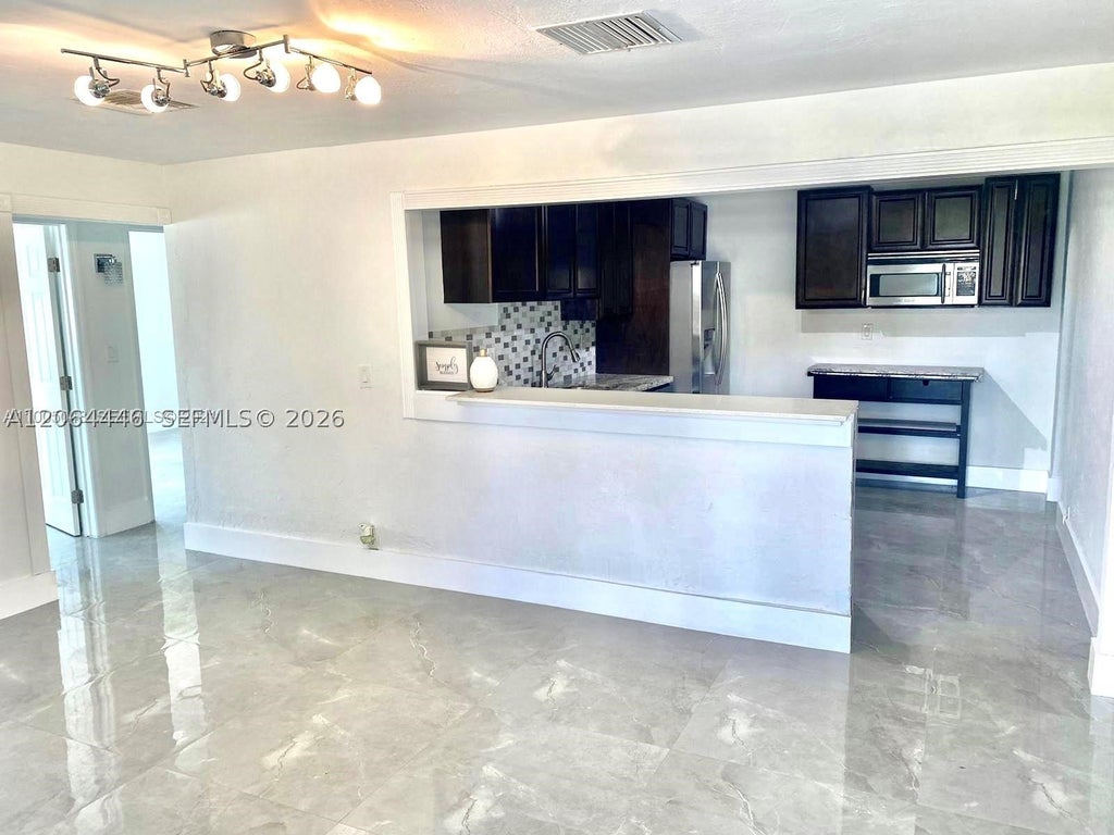 Photo of 112 Ronald Rd, West Park, FL 33023 (MLS # A12064446)