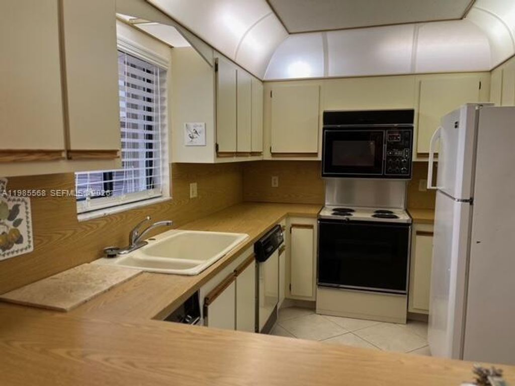 Photo of 12524 Shoreline Dr #104, Wellington, FL 33414 (MLS # A11985568)