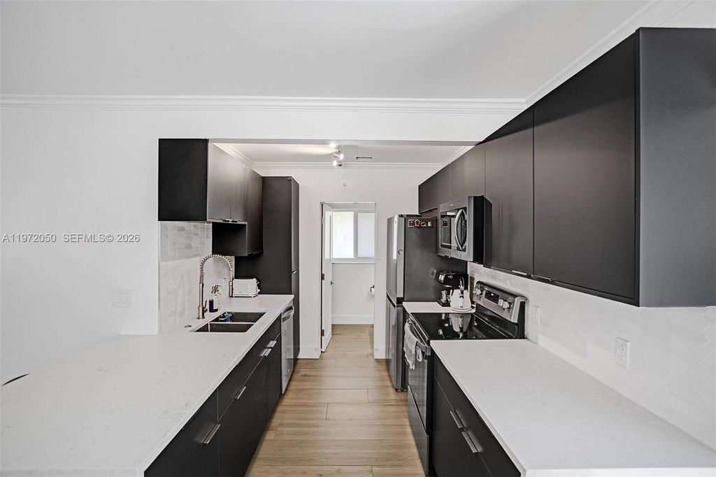 Photo of 3320 NE 13th Ave #3320, Oakland Park, FL 33334 (MLS # A11972050)