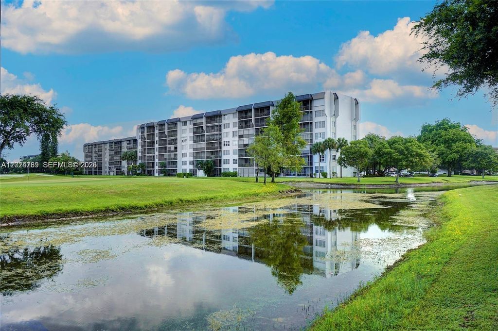 Photo of 3100 W Rolling Hills Cir #403, Davie, FL 33328 (MLS # A12024769)