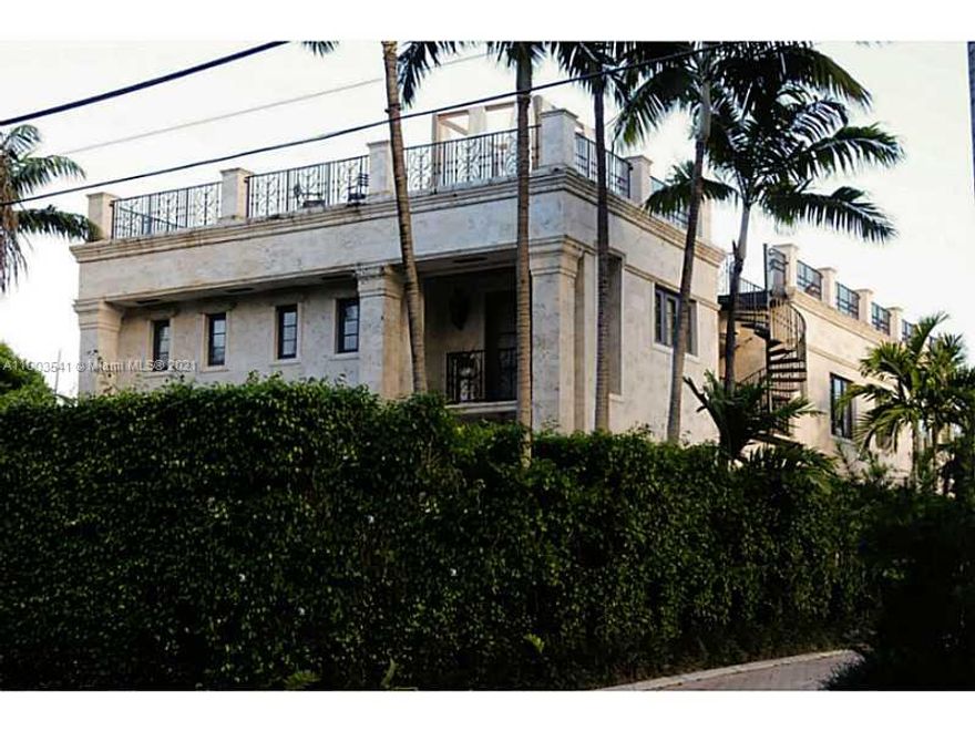 Two Story Italian inspired masterpiece. It is located on a private and guard gated Island in Miami Beach, Sunset Island IV.  This house has 4 bedroom, 1,000 Sq Ft the Master Suite with amazing view, Billiard room, gym, secured parking for 5 vehicle . The roof deck with summer kitchen, views of Biscayne Bay, Downton Miami & Islands.
New deck, (60ft on water). Walking distance to Lincoln Road and Sunset Harbor shops and restaurants. 15 minutes to airport. Live in an Island, very quiet in the middle of South Beach.