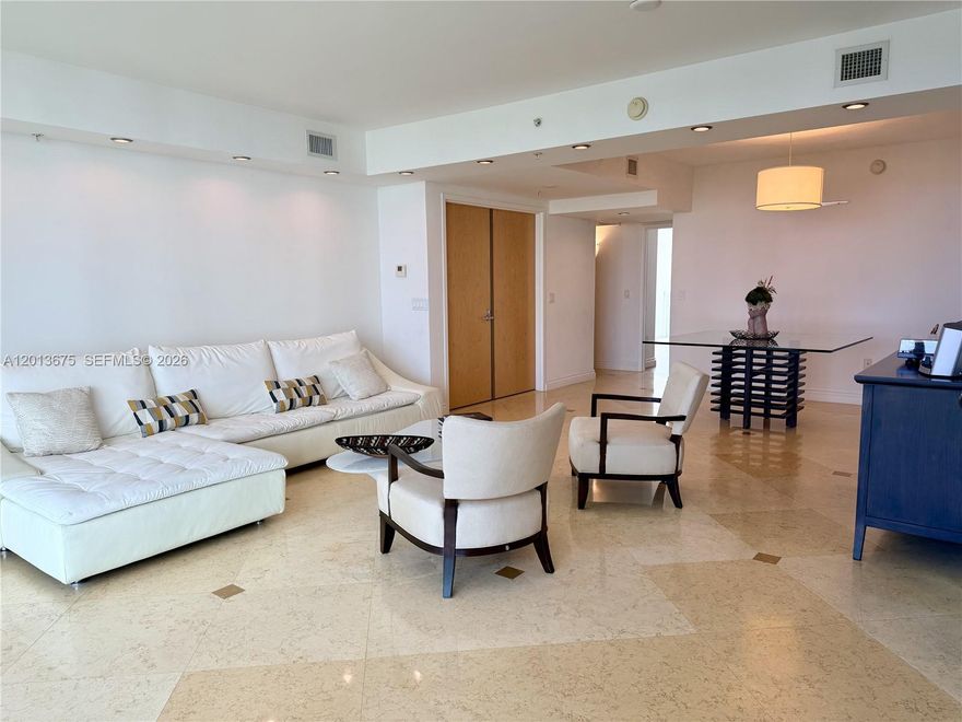 Lovely residence located in The Parc at Turnberry in the heart of Aventura, offering sweeping views of the Intracoastal, ocean, and surrounding marinas. This well-appointed unit features a private elevator entry with an exclusive foyer, creating a refined sense of arrival, along with two covered parking spaces.

The kitchen is designed with stainless steel appliances, custom wood cabinetry, granite countertops, a tiled backsplash, and a thoughtfully integrated breakfast nook, complemented by a brand-new refrigerator. The spacious layout includes 2 bedrooms and 3 full bathrooms, with the primary suite showcasing two private balconies. Both the primary and secondary bedrooms feature en-suite bathrooms for added comfort and privacy.

Additional highlights include a brand-new washer and dryer, impact-resistant windows, and a Shabbat elevator. Residents enjoy access to resort-style amenities, including a swimming pool, children’s pool, Jacuzzi, full-service spa with separate men’s and women’s facilities, massage rooms, a fully equipped fitness center, billiard and party rooms, a business center, and a children’s play area. Ideally situated with convenient access to nearby houses of worship.