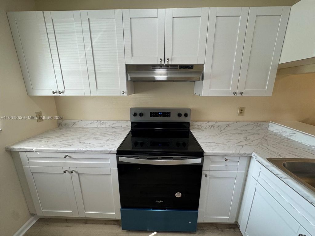 Photo of 4241 NW 114th Ter #4241, Coral Springs, FL 33065 (MLS # A11661283)