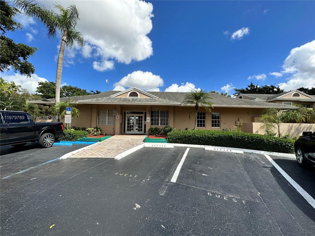 Photo of 1941 NW 96th Ter #8B, Pembroke Pines, FL 33024 (MLS # A11979789)
