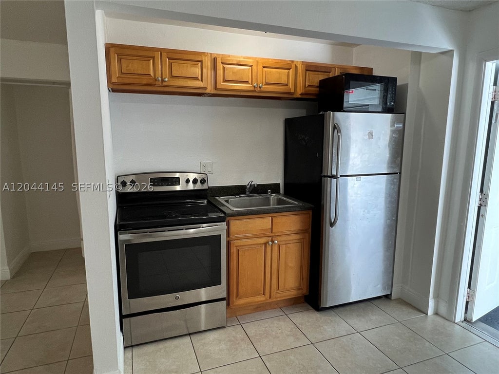 Photo of 4251 NW 5th St #126, Plantation, FL 33317 (MLS # A12044145)