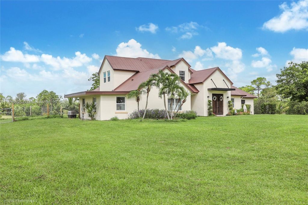Photo of 5681 Reynolds Rd, Wellington, FL 33449 (MLS # A11878125)