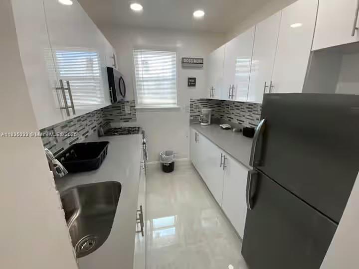 Location location location! An Amazing 4 plex in beautiful Hollywood Beach, located a short walk from the Hollywood Beach Broadwalk and various shops, restaurants and attractions. The property contains two-2bd 1 bath, and two-1bd 1 bath apartments. Completely renovated, new kitchen, tile floors, granite countertops, new bathrooms, stainless steel appliances, fully furnished and much more! Currently operates as Airbnb, with good cash flow as the area features numerous bars, restaurants and entertainment venues, including Margaritaville.