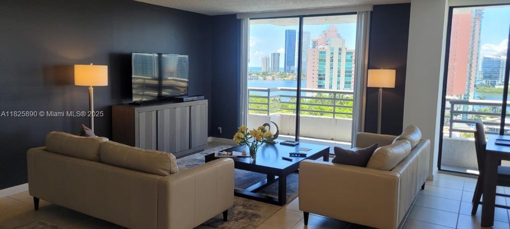 Beautiful Furnished 2 Bedrooms & 2 Bathrooms + Den. 3 Balconies Corner Unit With Stunning Inter-coastal And Ocean Views, Totally Upgraded, Large Spacious Living and Dining Room, Featuring a Separated Kitchen with Brand New Appliances. Washing/Dryer in the Unit. Luxury Residence Offers The Best In Aventura with Two Pools, Fitness Center, Sauna, Sundry Shop, Volleyball Courts, 24 Hour Security, Doorman, Valet Service and Parking Garage + Guest. Walk Distance to Aventura Mall, Jogging Circle and Shops. No Pets. Must see!