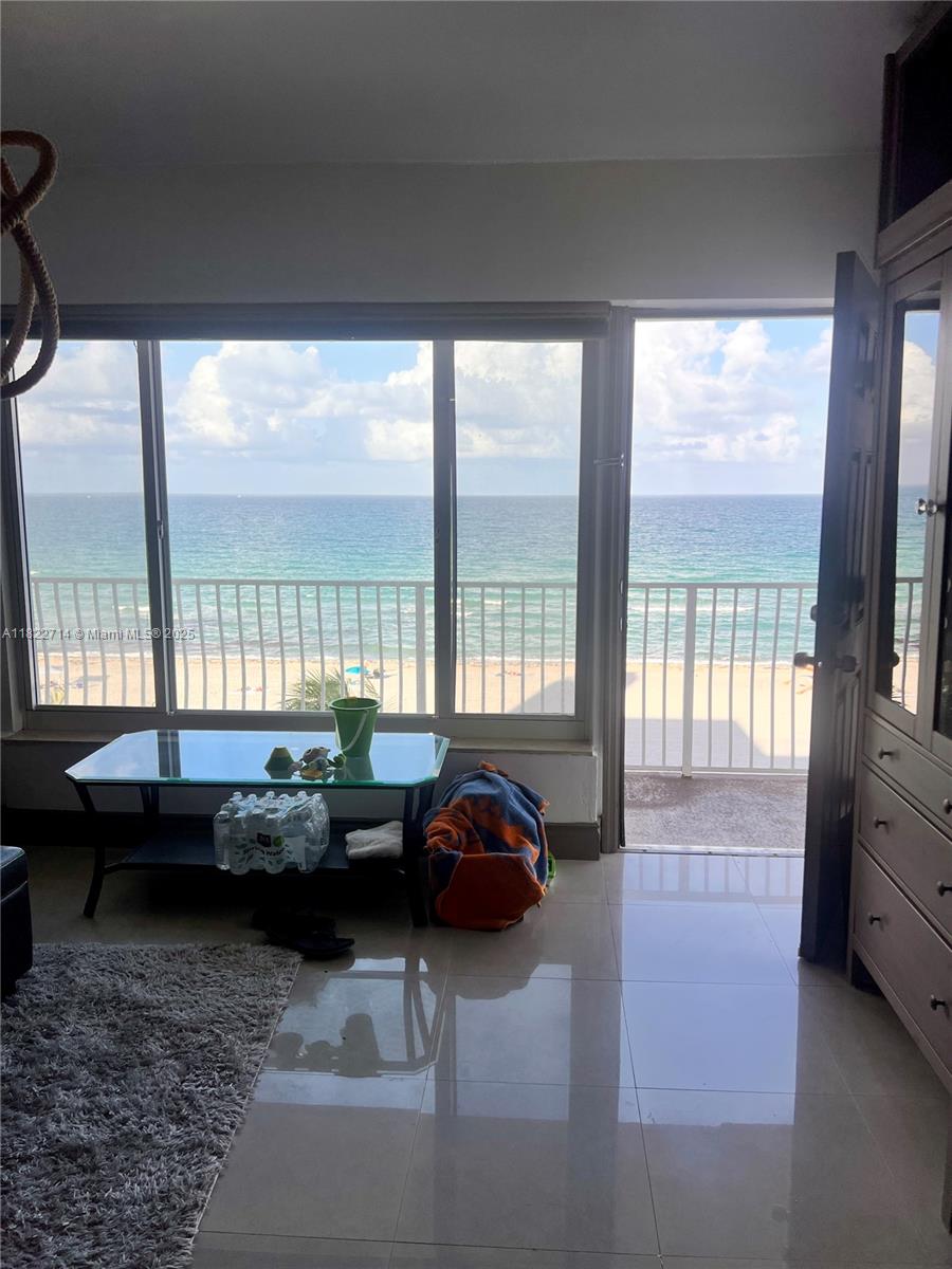 Fully furnished 1-bedroom condo with stunning ocean views and intercoastal sunsets. Located directly on the quiet Hollywood Beach boardwalk—no streets to cross, just steps from the sand. Features a spacious kitchen with large counter, perfect for cooking or entertaining. Ideal for snowbirds or anyone seeking a peaceful getaway. New roof recently completed and pool renovation underway. Classic Florida charm in a laid-back beachside setting