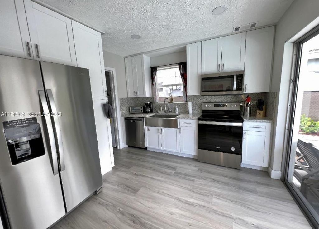 Photo of 2841 SW 4th Ct, Fort Lauderdale, FL 33312 (MLS # A11968907)