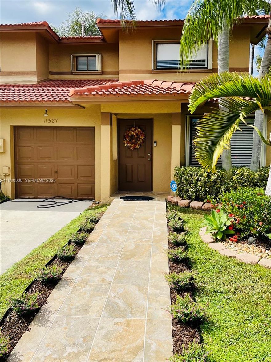 Rare Opportunity! This move-in ready corner townhouse offers 3 bedrooms, 3 full bathrooms, a private 1-car garage, and hurricane accordion shutters for added peace of mind. Located in a safe, serene, and well-maintained community, you’ll be just minutes from Palms at Town & Country, dining, and Miami Dade College Kendall Campus, with easy Turnpike access for stress-free commuting.
This highly sought-after neighborhood delivers the perfect blend of comfort, convenience, and modern living. Plus, major updates are already complete—roof replaced in 2020 and AC in 2022—so you can enjoy peace of mind. 

Schedule your tour today and make this home yours!