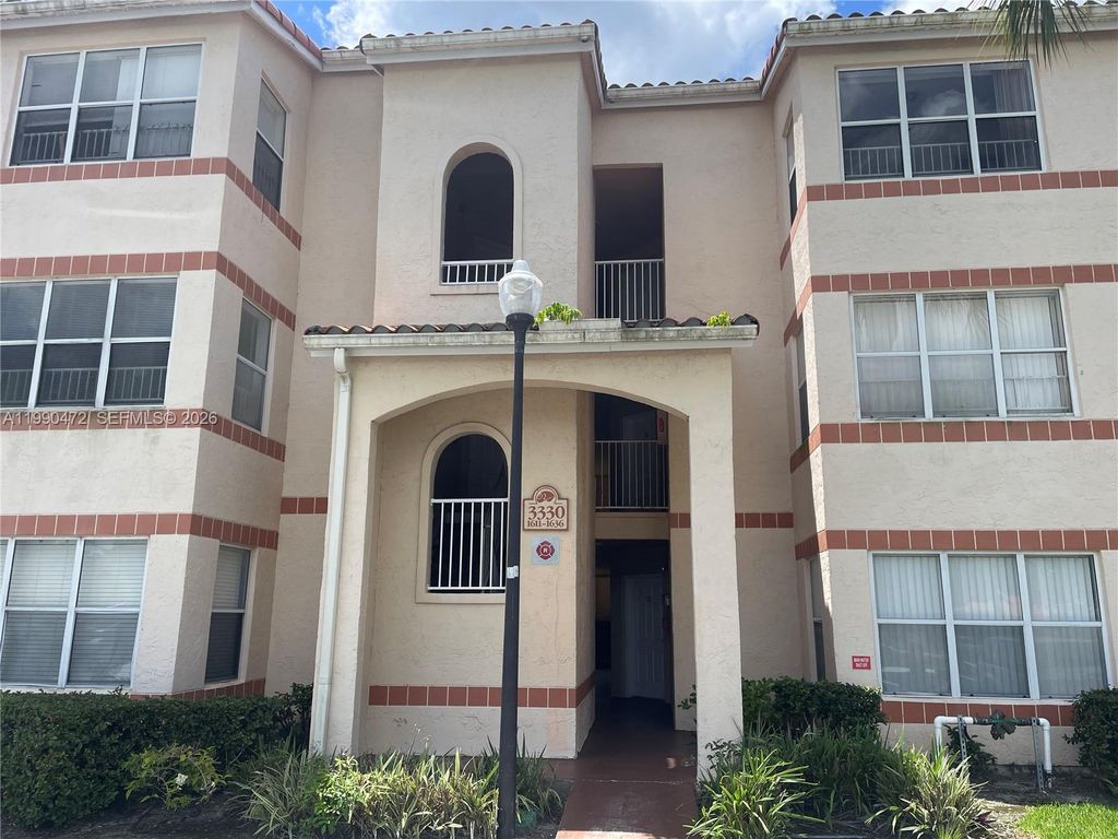 Photo of 3330 N Pinewalk Dr N #1636, Margate, FL 33063 (MLS # A11990472)