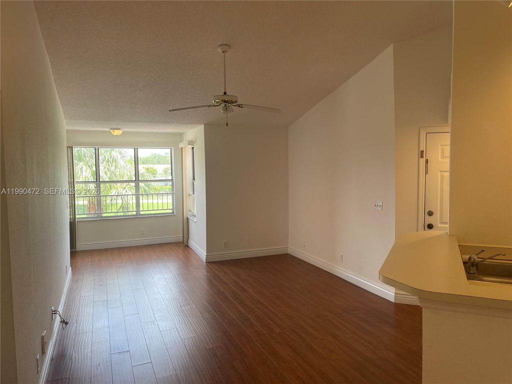 Photo of 3330 N Pinewalk Dr N #1636, Margate, FL 33063 (MLS # A11990472)