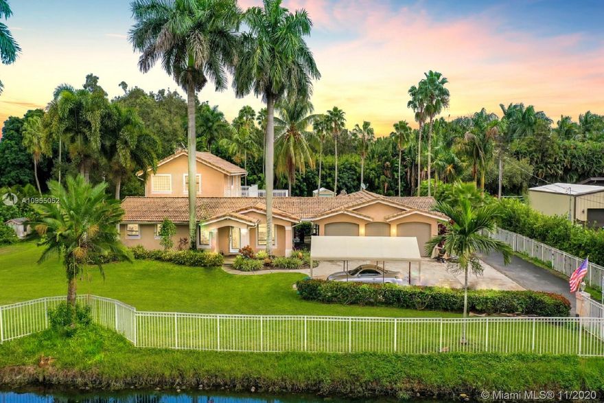 INCREDIBLE OPPORTUNITY TO LIVE ON A 47,825 SF WATERFRONT LOT IN ONE OF THE MOST DESIRABLE AREAS OF THE RURAL EQUESTRIAN FRIENDLY TOWN OF SOUTHWEST RANCHES. PRIVATE ELECTRIC GATED ENTRY LEADS TO FULLY FENCED PROPERTY. HOME OFFERS 2,922 SF OF LIVING AREA WITH A SPECTACULAR 4 CAR, 780 SF, GARAGE. 4TH BEDROOM CURRENTLY USED AS A HOME GYM. SPACIOUS EAT-IN KITCHEN OFFERS TONS OF CABINETS, GRANITE COUNTERS & STAINLESS STEEL APPLIANCES. HUGE UPSTAIRS PRIVATE, PRIMARY SUITE W FIREPLACE & STUNNING VIEW OF GROUNDS FROM THE ROOM AND FROM BALCONY. UPDATED ENSUITE W GORGEOUS SHOWER AND DOUBLE VANITY. FABULOUS GROUNDS W TIKI HUT, SHED AND DECK TO ABOVE-GROUND POOL. BRING YOUR RV, BOAT, ATVS, & HORSES. NO HOA. ENJOY THE BEST OF BOTH WORLDS IN A RURAL ENVIRONMENT W/ EASY ACCESS TO SHOPS, RESTAURANTS, I-75.