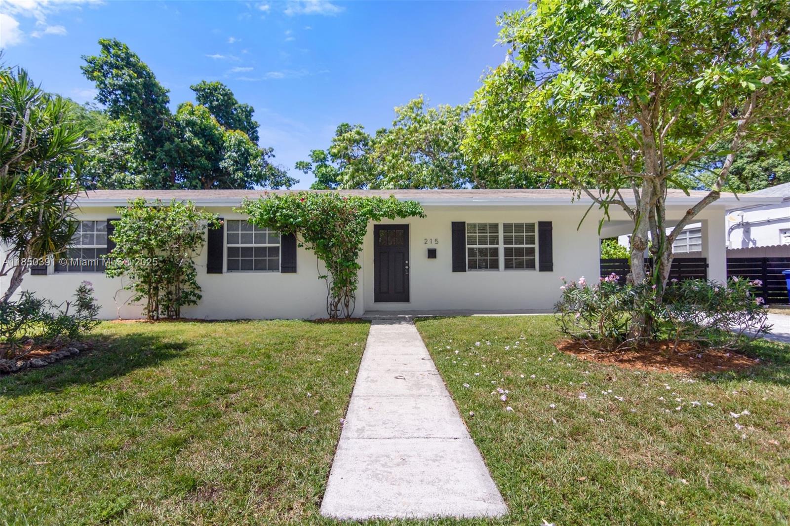 Beautifully renovated and filled with natural light, this 3-bedroom, 2-bathroom home is ideally located in Coral Gables, just steps from Carver Elementary. The interior features brand new flooring throughout, a thoughtfully designed kitchen with hardwood cabinetry and quartz countertops, and stylishly updated bathrooms with modern vanities and custom tile work. A spacious, fenced-in backyard with a deck area offers the perfect setting for entertaining or family play. Enjoy the convenience of brand-new appliances, including a dishwasher and front-loading washer and dryer. All just minutes from Coconut Grove, Merrick Park, and Trader Joe’s on US1.