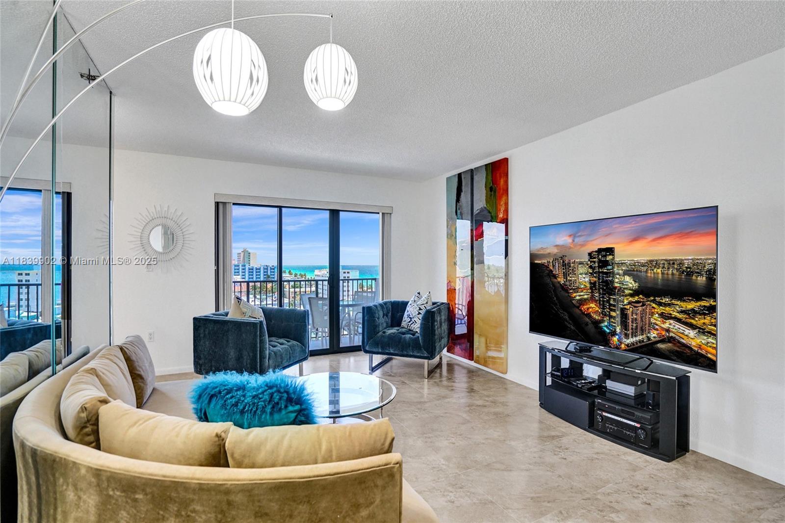 Experience the ultimate beachfront lifestyle in this stunning oceanfront condo situated on the famous Hollywood Beach Boardwalk. Furnished, move-in ready residence offers breathtaking ocean & intracoastal views from every room, combining luxury, convenience, and style in one package. Furnished with upscale, furniture and stylish decor.Modern, fully equipped kitchen with new stainless steel appliances. Two spacious primary bedrooms, each with queen-size beds and private ensuites. Upgraded shower for a spa-like experience. New hot water heater, New impact windows and doors for energy efficiency and soundproofing Elegant porcelain flooring throughout. Custom closets. Building amenities include resort-style pool, fitness center, lounge areas, and 24/7 security with concierge services.