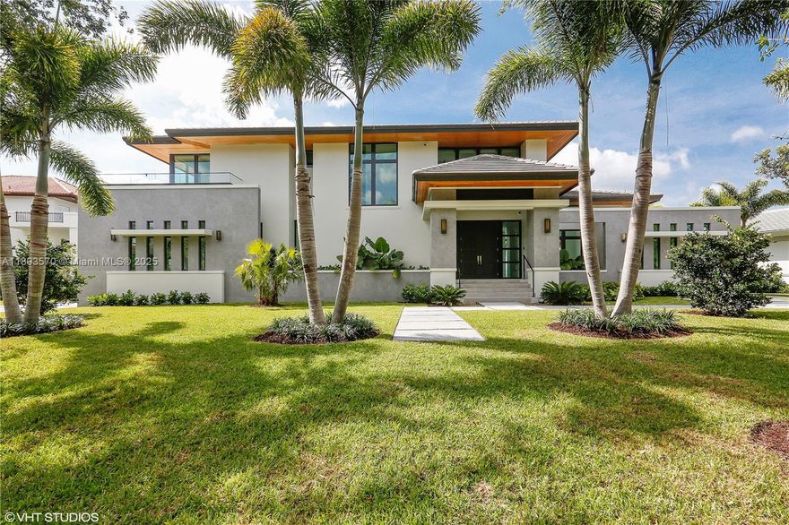 Built in 2019. Exceptional modern smart estate in the prestigious Islands of Cocoplum. This 6,851 SF home offers 6 bedrooms, 7.5 baths, plus a studio. Highlights include the master suite with a private balcony overlooking a custom pool and landscaping. Custom closets throughout. Designer Leicht/Hausscape kitchen featuring German craftsmanship, quartz countertop, and Sub-Zero/Wolf/Miele appliances. Impressive garage with 20' ceilings accommodates 4 vehicles with lifts and an EV charger. Enjoy an integrated Sonos sound system, CGI impact windows/doors, and smart automation systems controlling climate, lighting, and shades. Residents have access to the exclusive Cocoplum Club House amenities: fitness center, tennis, pickleball, volleyball courts, and community pool.