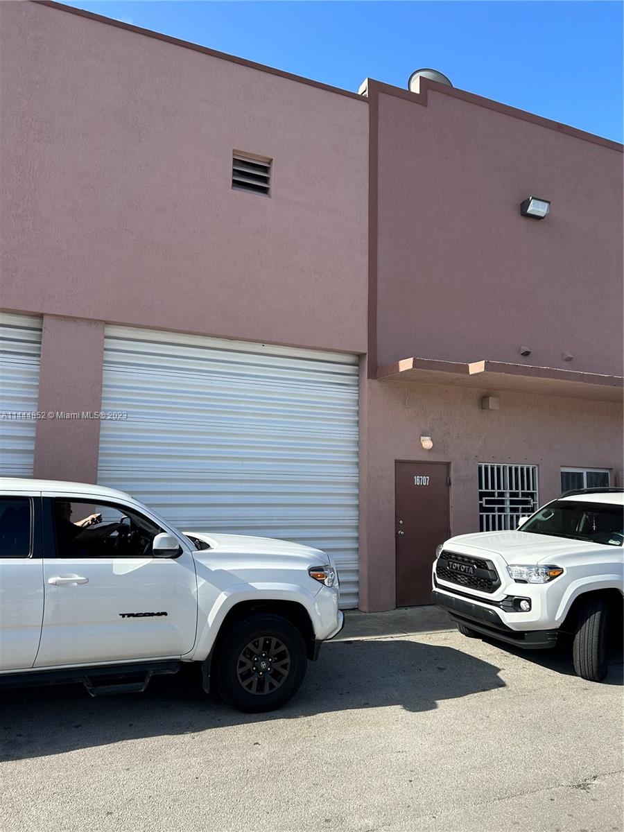 Impeccable Warehouse for sale in Hometown Business Center conveniently located on SW 117th Ave close to the SW 152nd St Turnpike Interchange. Includes large bathroom and enclosed mezzanine used presently as a recording studio. Walls and flooring has carpet for sound purpose but can easily converted back to original state.
All block walls and metal stairs have been sealed and painted. The ceiling is insulated and painted with epoxy flooring. Unit includes brand new 4 Ton Air conditioner with a 5 year warranty from the manufacturer. Oversize motorized garage door. Entire warehouse development has fire sprinklers and unit comes with hard wired alarm system. Warehouse development includes gated community and completely fenced around for added security. UNIT WILL NOT LAST