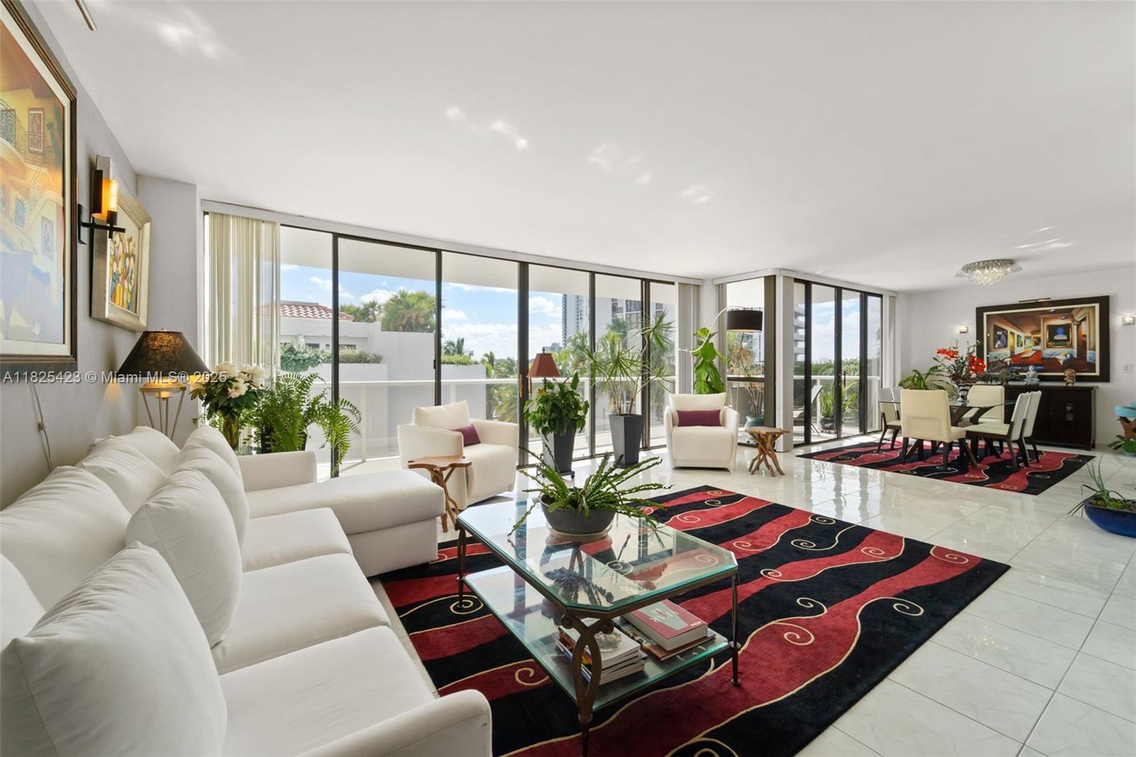 Fabulous, Modern Corner Residence at Hamptons West
Residence 201 is a recently renovated 2BD/2BA corner unit with over 1,800 sq ft, floor-to-ceiling windows, and wraparound terraces. Features include a sleek kitchen with quartz counters, wood cabinets, frosted glass, and large pantries. Custom marble baths with imported vanities, spa-style showers, and jacuzzi. UV air handler, artisan lighting, and LED upgrades throughout. Split layout for privacy. Enjoy resort-style amenities: pools, spa, gym, tennis, theater, private restaurant—right in the heart of Aventura.