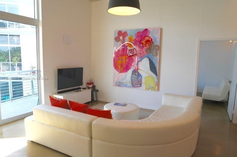 1 Bed 1 Bath Loft Style Residence at the sought after Meridian Boutique Building. Across the street from golf course and Botanical Gardens, a couple blocks to Lincoln Road walking district, sunset harbor, grocery stores and to the beach. High ceilings, huge balcony, very quiet hallway facing courtyard, no street noise. SS appliances, polished concrete floors, option to be sold furnished.
Unit 412 will include Architectural and concept drawings to convert unit into a 2 bedroom 2 Bathroom. Drawings available for viewings. Motivated Sellers.
The Meridian is a boutique style building with 24-hour security and concierge, a heated rooftop pool & jacuzzi, fitness centre and on-site management. 1 Deeded underground parking spot included.