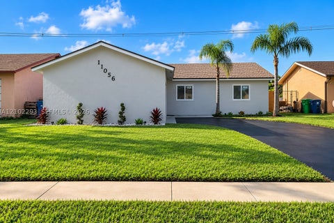 Photo of 11056 NW 23rd Ct, Sunrise, FL 33322 (MLS # A12102293)
