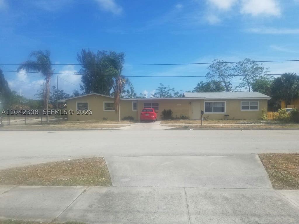 Photo of 4214 Greenwood Ave, West Palm Beach, FL 33407 (MLS # A12042308)