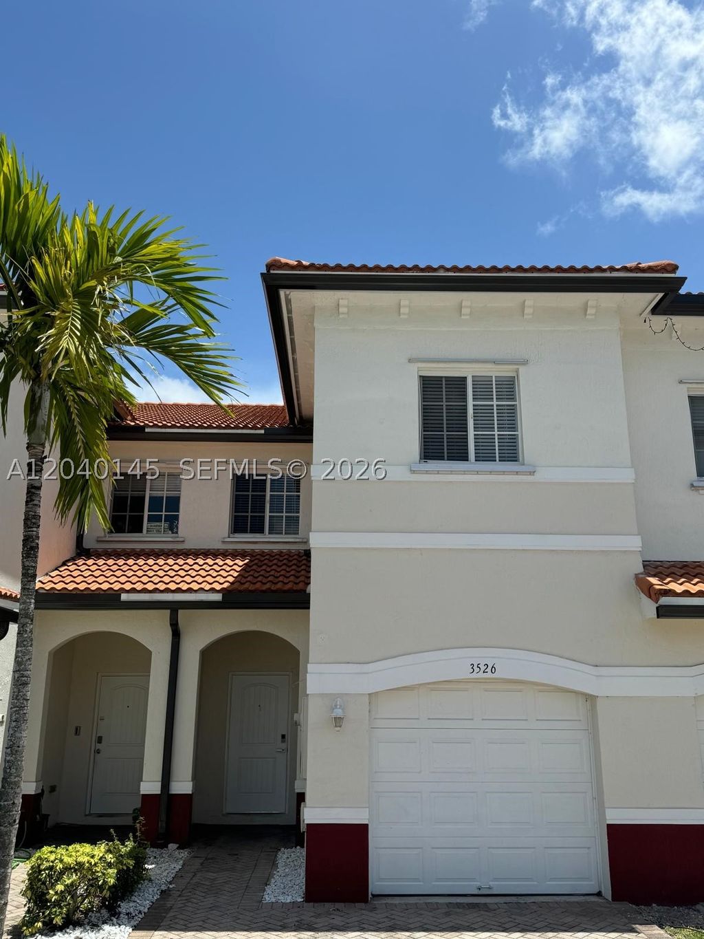 Photo of 3526 NW 29th Ct #3526, Lauderdale Lakes, FL 33311 (MLS # A12040145)
