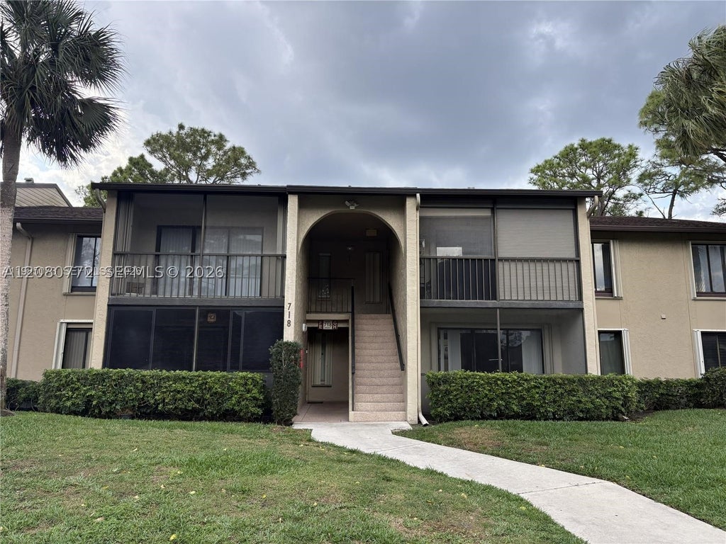Photo of 718 Sunny Pine Way #F2, Green Acres, FL 33415 (MLS # A12080772)