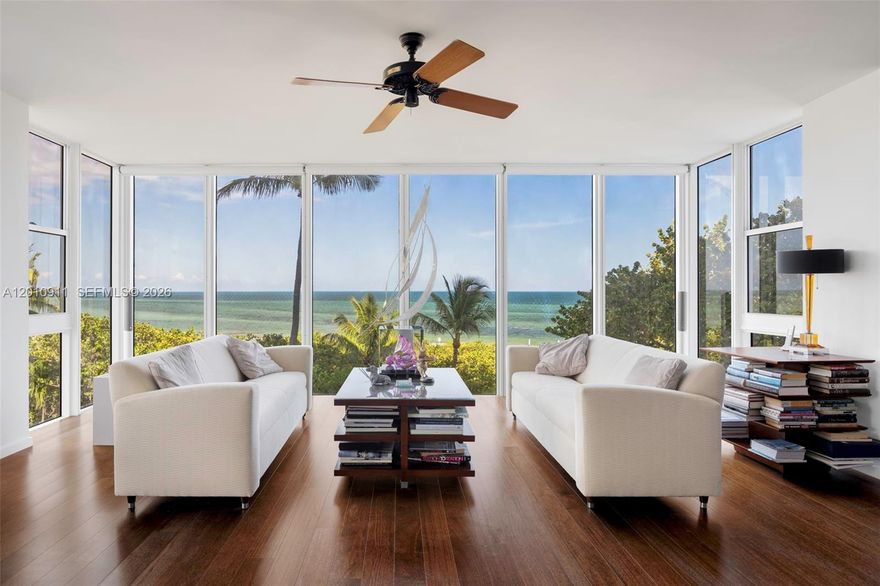 A premier oceanfront residence in Key Biscayne offering sweeping panoramic views and direct beach access just steps away. Positioned on the coveted 01 line, this expansive 3-bedroom plus den, 3-bath home features sunlit interiors and floor-to-ceiling windows that frame the ocean from nearly every room, creating a seamless connection to the horizon. Generous living and dining areas are designed for both relaxed daily living and effortless entertaining, while refined finishes and thoughtful details enhance the overall sense of comfort and sophistication. The well-proportioned layout includes a versatile den ideal for a home office or additional lounge space. Complete with impact glass, an open balcony, and access to full-service building amenities, this residence captures the essence of elevated coastal living in one of Key Biscayne’s most desirable beachfront communities.