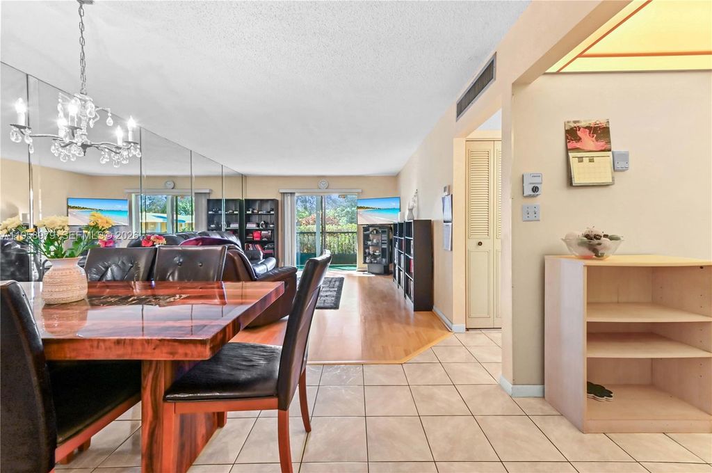 Photo of 701 NE 1st Ct #110, Hallandale Beach, FL 33009 (MLS # A11958979)