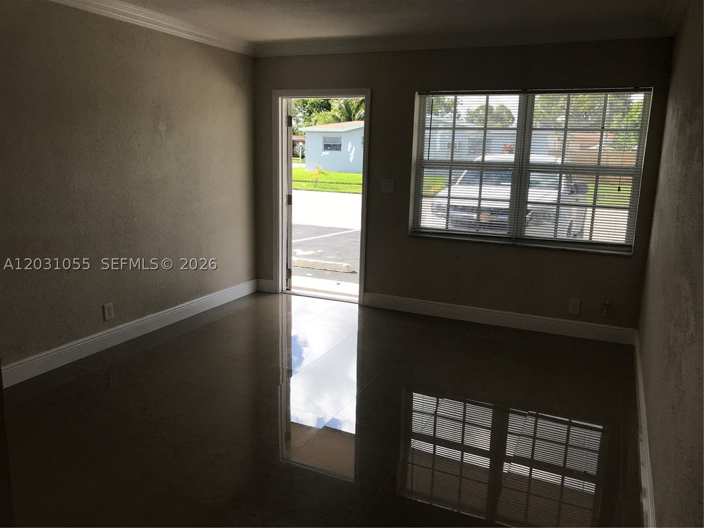 Photo of 4260 NW 31st Ter, Lauderdale Lakes, FL 33309 (MLS # A12031055)