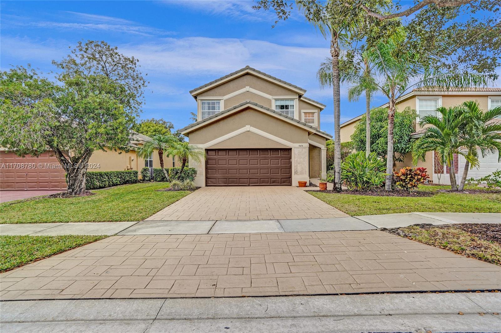 WOW! GREAT BUY ON THIS 4 BEDROOM HOME IN POPULAR GATED PARKSIDE ESTATES IN THE HEART OF PARKLAND! BRAND NEW LUXURY WATERPROOF PLANK FLOORING FOR STAIRS AND ENTIRE SECOND FLOOR! UPGRADED KITCHEN WITH GRANITE COUNTERS, STAINLESS STEEL APPLIANCES AND BUILT-IN ENTERTAINMENT BAR WITH BEVERAGE FRIDGE AND WINE RACK! NEUTRAL DIAGONAL "MARBLE LOOK" TILE THROUGHOUT FIRST FLOOR! HURRICANE IMPACT GARAGE DOOR! PRIVATE REAR YARD WITH OVERSIZED CONCRETE PATIO! TOP "A" RATED SCHOOLS! PLEASE SEE FACT SHEET!