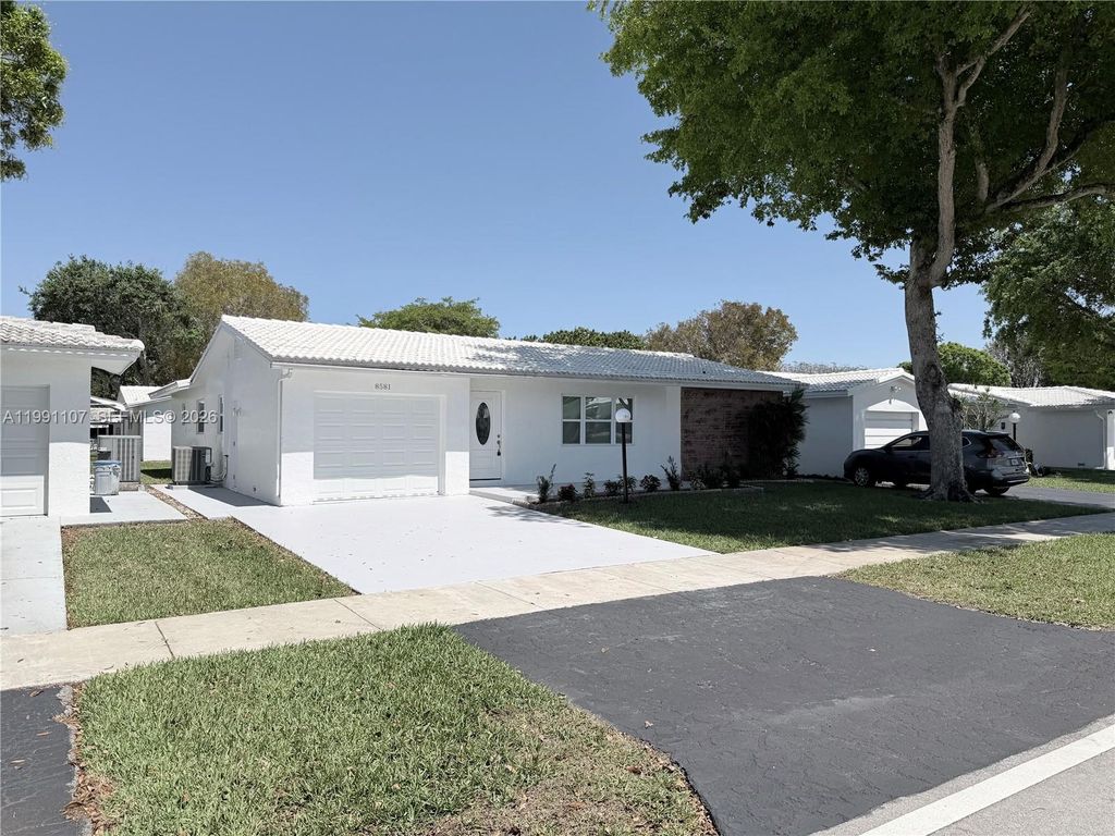 Photo of 8581 NW 17th St, Plantation, FL 33322 (MLS # A11991107)
