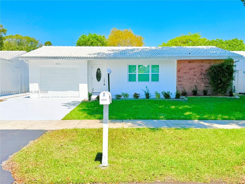 Photo of 8581 NW 17th St, Plantation, FL 33322 (MLS # A11991107)