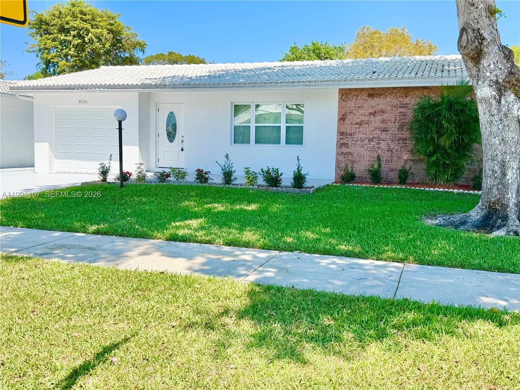 Photo of 8581 NW 17th St, Plantation, FL 33322 (MLS # A11991107)