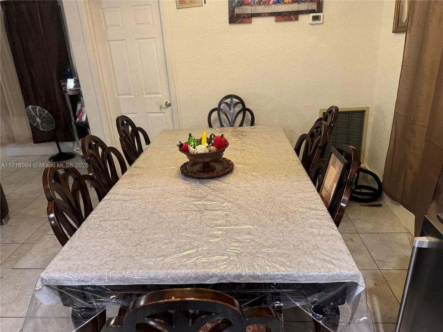 Beautiful and well maintained single house of of 4 bedroom/2 bathroom with a Florida room. Located in a quiet neighborhood close to school in shopping. Updated new kitchen cabinet with island granite counter top , new impact windows, both bathroom update and new roof January 2020. Fresh painted, clean and well maintained with great outdoor combining with a private pool and mature fruit trees coconut, banana ect. Don't missed this great opportunity! seller is in the process in repairing the pool