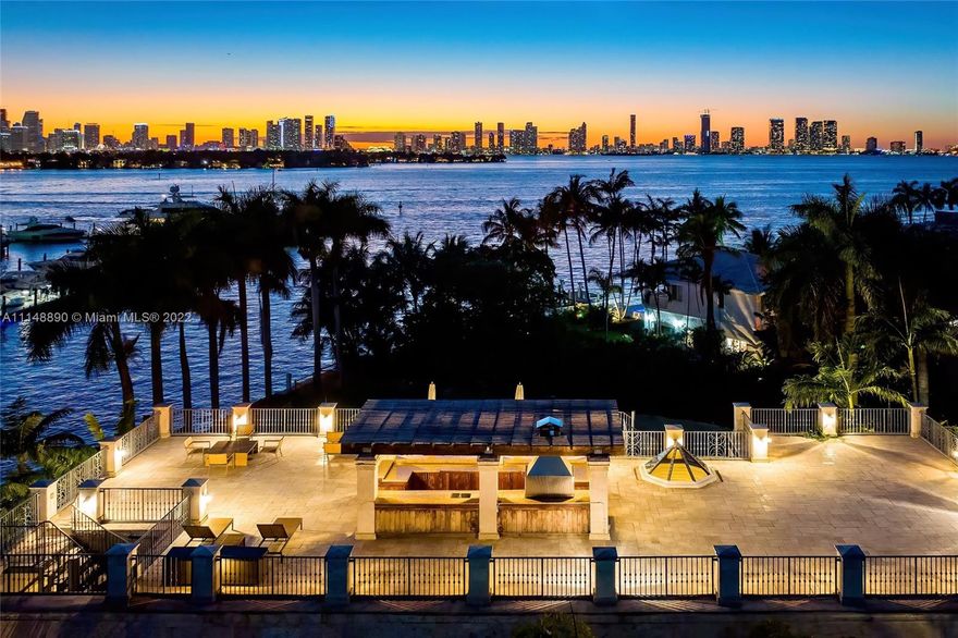 Enjoy Mediterranean luxury w/ modern amenities in this one-of-a-kind waterfront residence. Villa Saint Tropez, located on private & guard-gated Sunset Island IV, the most walkable of the 4 islands. Enjoy incredible Biscayne Bay, skyline/sunset views. This 6BR/5+1BA home boasts brand new bleached oak flooring, new roof, new gourmet kitchen w/ Wolf/SubZero appliances, 1,000 SF principal bedroom w/ seating area & spa bath surrounded by beautiful water views, den w/ ensuite bathroom, wine cellar, 5 car parking spaces & private dock. Entertainer’s dream, the residence features 360 degree, 3,600 SF rooftop terrace, full bar & endless views East to the beach, North to Sunny Isles & west to downtown. Daylight envelops the entire home through wraparound floor-to-ceiling windows.