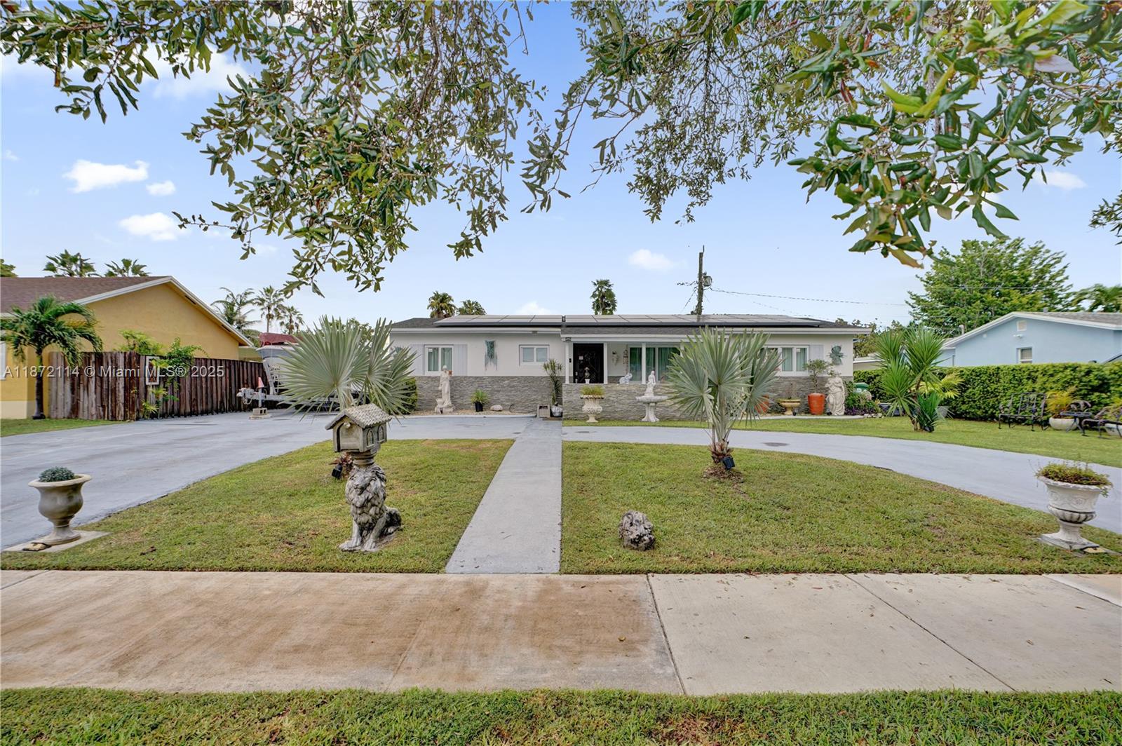 This beautifully updated 4-bedroom, 2-bath single-family home in Cutler Bay features a spacious layout with an extra room/playroom, new flooring, recessed lighting, crown molding, and custom closets for additional storage. The modern kitchen boasts quartz countertops, stainless steel appliances, and a wall-mounted microwave and oven, while recent upgrades include a 2023 roof, paid-off solar panels, and some impact windows and doors. With no HOA and no flood zone, the property offers peace of mind along with a generous backyard—perfect for entertaining or accommodating an RV or boat—plus ample parking and a prime location close to schools, shopping, and major highways. Home is larger than tax roll, totaling 1,940 sq. ft.