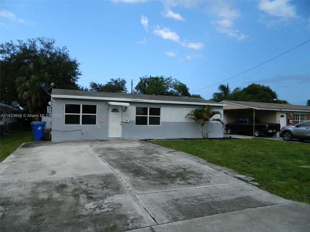 Photo of 1340 SW 34th Ave, Fort Lauderdale, FL 33312 (MLS # A11433645)