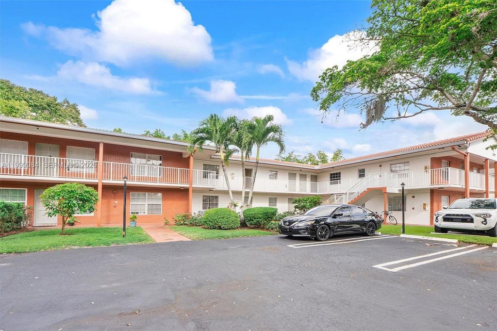 Photo of 3100 Coral Springs Dr #1H, Coral Springs, FL 33065 (MLS # A11999984)