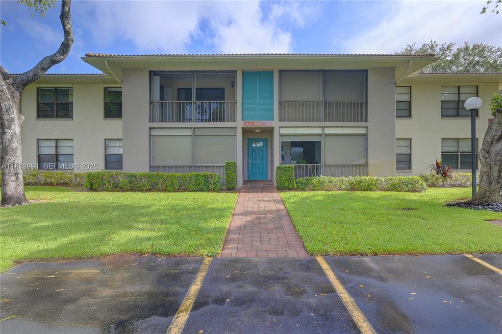 Photo of 9965 Pineapple Tree Dr #203, Boynton Beach, FL 33436 (MLS # A11813991)