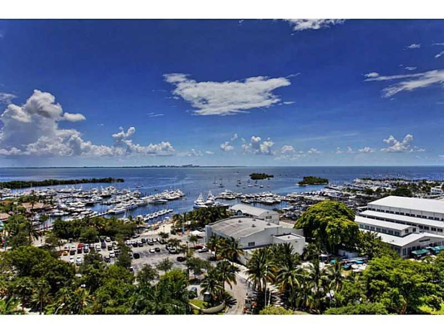 Expansive views of Biscayne Bay and downtown Coral Gables from this flow-thru, split plan, 3 bedroom/3.5 bath unit.  Private elevator takes you to this spacious apartment in one of Miami's most sought after buildings, designed by Ugo Columbo. Apartment fe atures include 2 separate living areas, open gourmet kitchen with European appliances, designer bathroom suites, numerous over-sized balconies, wood flooring throughout the apartment, walk in closets, and custom blinds.